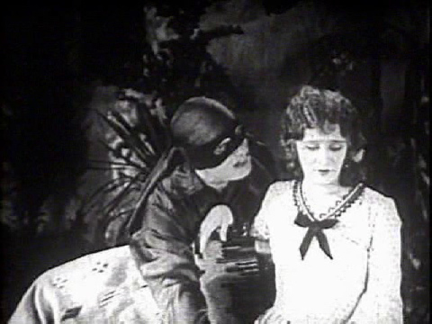Douglas Fairbanks as Zorro and Marguerite De La Motte as Lolita Pulido in The Mark of Zorro (1920)