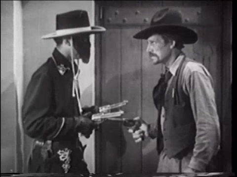 John Carroll in Zorro Rides Again (1937)