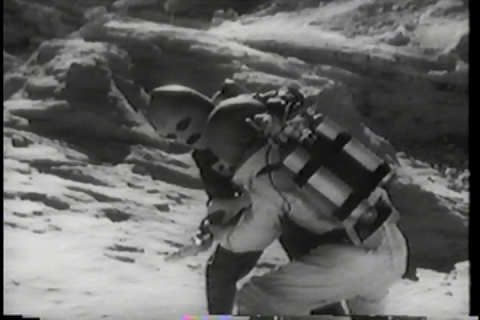 George Wallace as Commando Cody (aka the Rocketman) fighting a moon man in Radar Men from the Moon (1952)